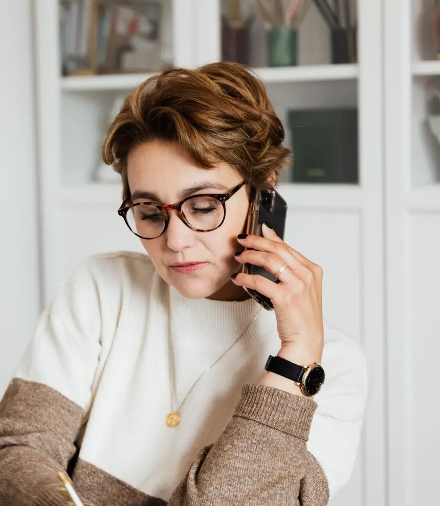 Council customer service officer taking a call at her desk
